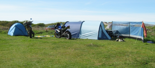 2 tents and 2 motorcycles at the campsite in trearddur bay